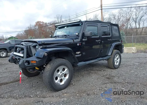 2014 Jeep Wrangler Unlimited Sahara from USA, damaged, VIN 1C4BJWEGXEL110669